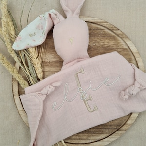Light pink muslin baby bunny comforter. Pastel pink cuddle bunny toy