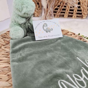 May include: A handmade, wooden cutting board with a natural finish. The board features a live edge on one side and a rectangular shape. It is approximately 18 inches long and 12 inches wide.