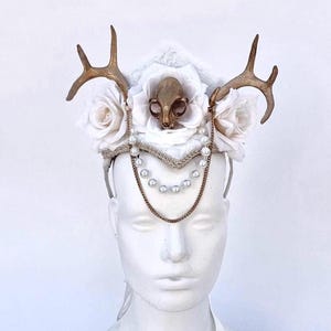 Mystical white skull headpiece with gold horns