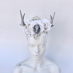 Mystical white skull headpiece with silver horns