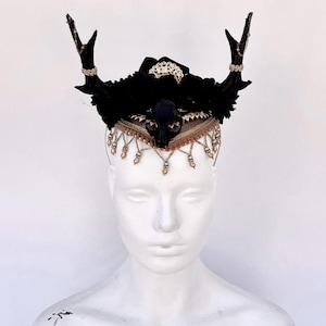 Mystical dark black skull headpiece with gold horns