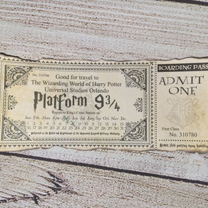May include: A vintage-style ticket for the Wizarding World of Harry Potter at Universal Studios Orlando. The ticket is labeled "Platform 9 3/4" and has a calendar with the months of the year. The ticket also says "Boarding Pass" and "Admit One".
