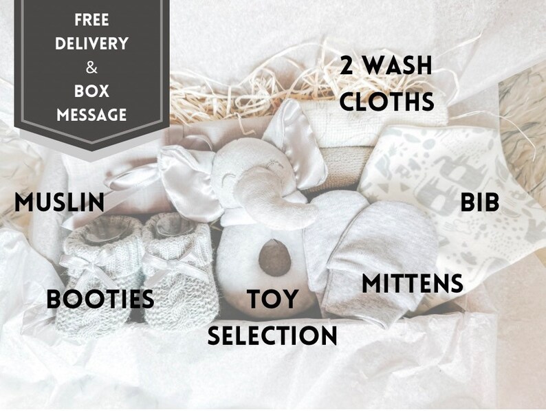 Puede incluir: Una caja de regalo para beb&eacute; gris y blanca con un juguete de elefante gris, botines grises, guantes grises, un babero gris y dos toallitas. La caja tambi&eacute;n incluye una manta de muselina gris y un juguete gris.