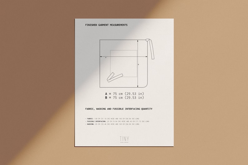 May include: Diagram showing the measurements for a finished garment. The measurements are labeled A and B, and are both 75 cm (29.53 in). The diagram also includes information about the fabric, wadding, and fusible interfacing quantity needed for the garment.