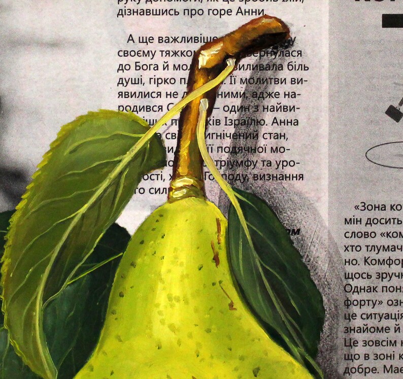 May include: An oil painting of a bright yellow pear with a brown stem and two large green leaves. The pear is positioned directly over a background of printed newspaper text in a Cyrillic script, creating a contrast between the fruit and text.