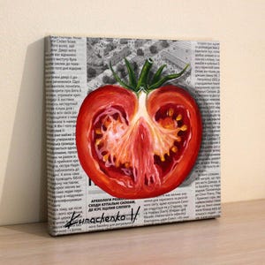 May include: A painting of a red tomato cut in half, with seeds visible. The tomato is painted on a background of a newspaper article with the text "Archeologists discovered the bathing pools of Siloam, where Jesus healed the blind man." and the signature "Kumachenko V."