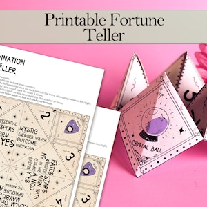 May include: Printable fortune teller game with a retro design. The fortune teller is made of paper and has a crystal ball design. The fortune teller is folded up and ready to be used.