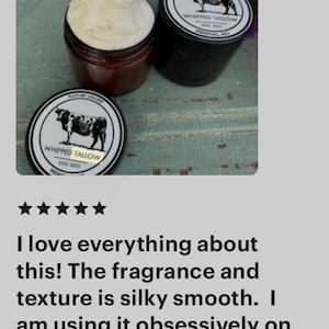 May include: Two jars of whipped tallow, one open with a fluffy white substance, the other closed with a black lid and a cow illustration. The jars have labels with the text "WHIPPED TALLOW".
