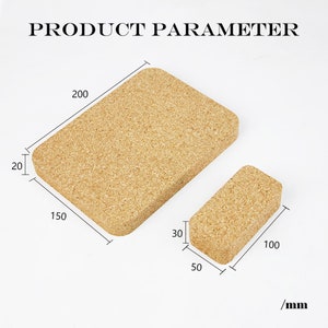 K&ouml;nnte beinhalten: Zwei Korkuntersetzer, einer rechteckig und einer quadratisch, mit Ma&szlig;en in Zentimetern. Der gr&ouml;&szlig;ere Untersetzer ist 15 cm x 20 cm gro&szlig; und der kleinere 5 cm x 10 cm.