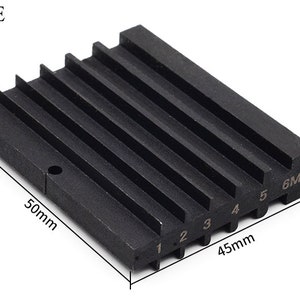 May include: Black metal ring sizing gauge with six numbered slots, measuring 1.11 inches by 1.77 inches by 2 inches.