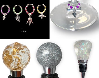 Wine bottle stopper with set of four wine glass charms