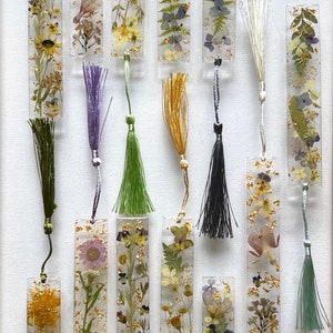 Clear pressed flowers bookmarks with tassels