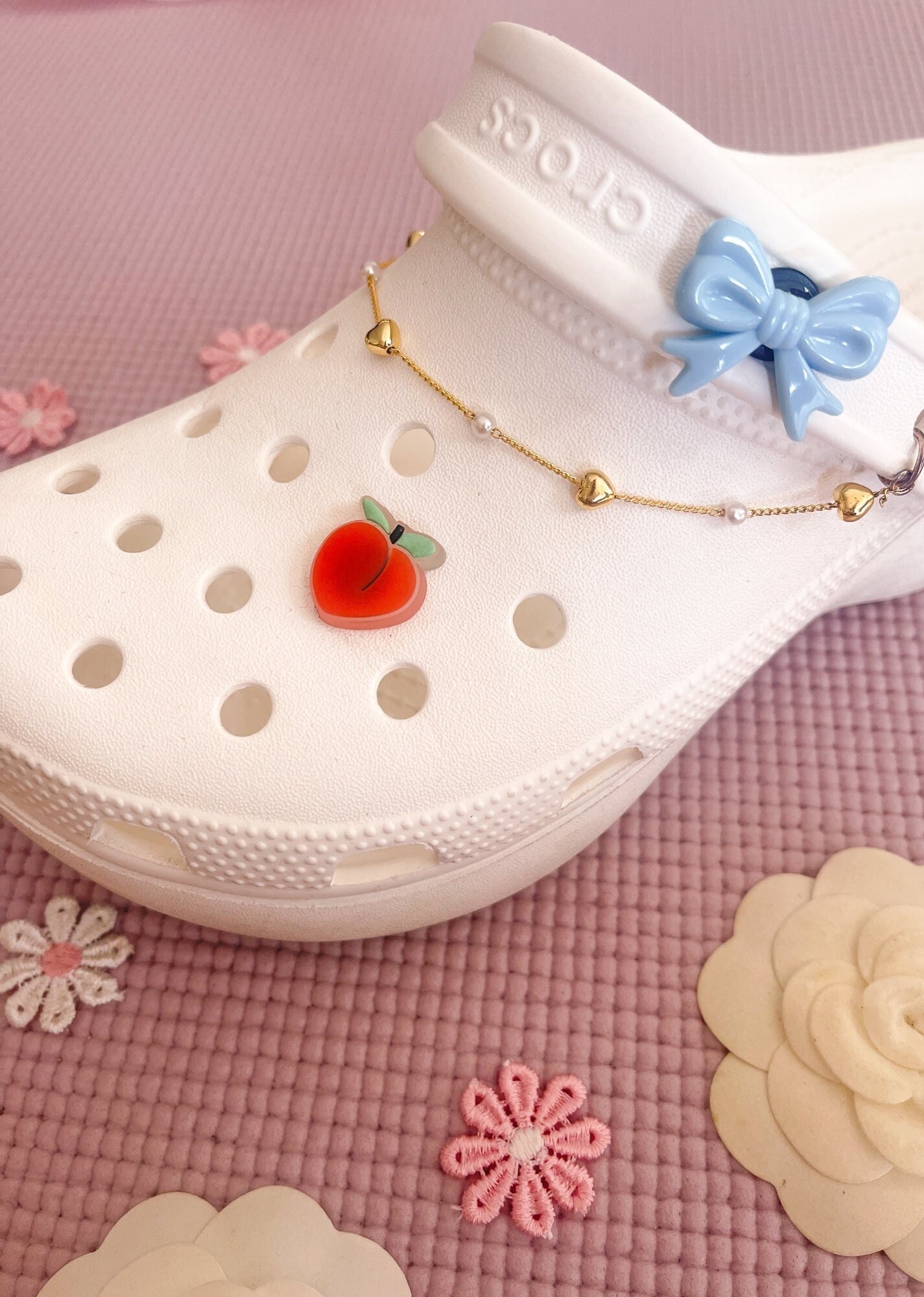platform crocs with charms