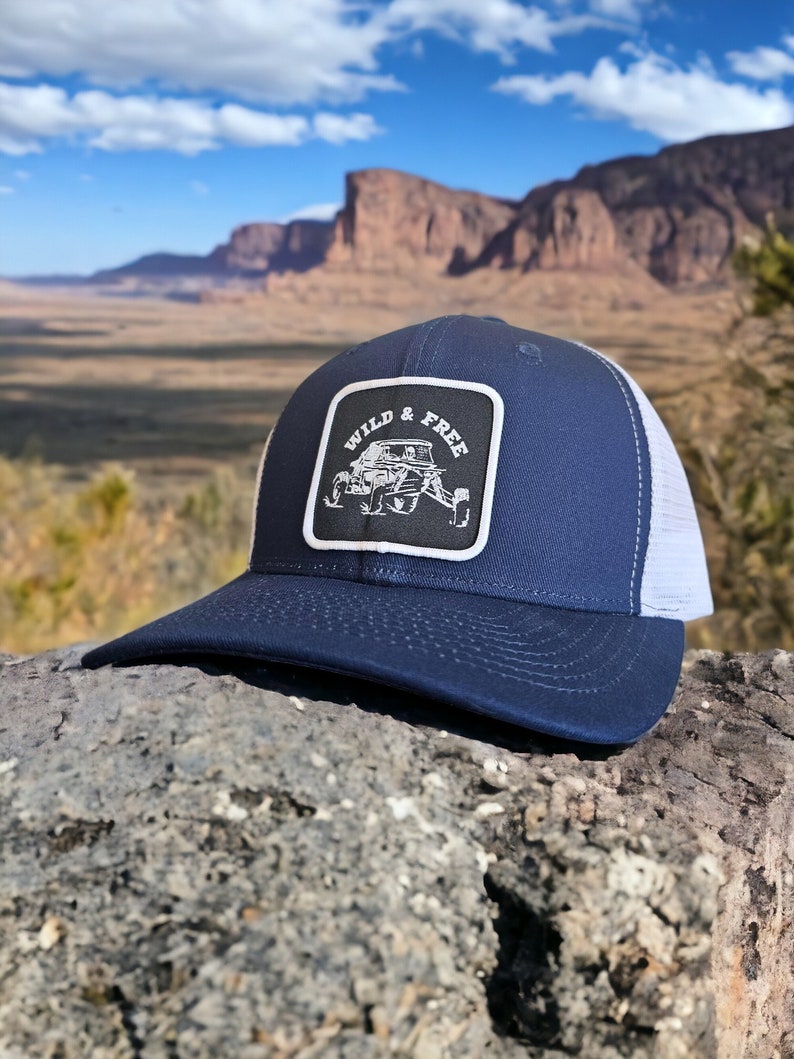 UTV Trucker Hat With Wild And Free Patch Navy Blue on White Mesh