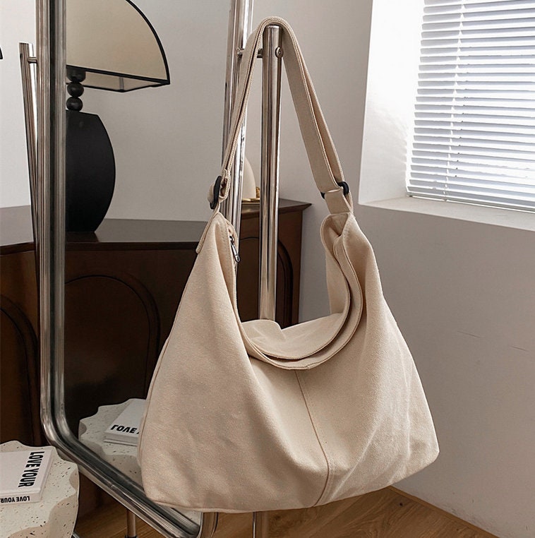 Hermés 2006 Tan Canvas Travel Tote – Vintage by Misty