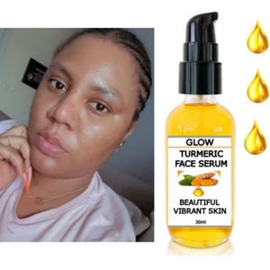 May include: A clear glass bottle with a black pump top filled with a yellow liquid. The bottle label reads "Glow Turmeric Face Serum" and "Beautiful Vibrant Skin". The bottle is 30 ml. Three drops of yellow liquid are shown in the background.