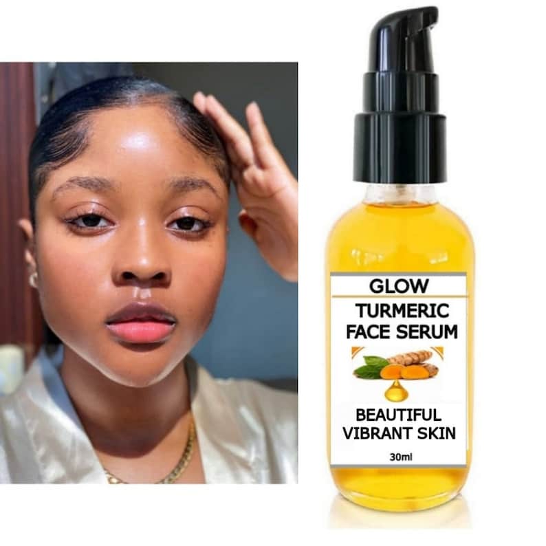 May include: A clear glass bottle with a black pump top filled with a yellow liquid. The label reads "Glow Turmeric Face Serum" and "Beautiful Vibrant Skin". The bottle contains 30 ml of serum.