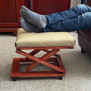 Adjustable Height Foldaway Footrest