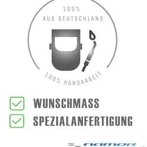 May include: A white and green checkmark icon next to the text "Wunschmass" and another white and green checkmark icon next to the text "Spezialanfertigung". A circle with a welding mask and torch inside and the text "100% AUS DEUTSCHLAND 100% HANDARBEIT" around it. The text "namor wir liefern qualit&auml;t" is at the bottom of the image.