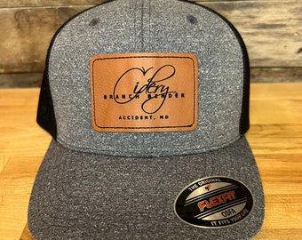 Hat with leather patches
