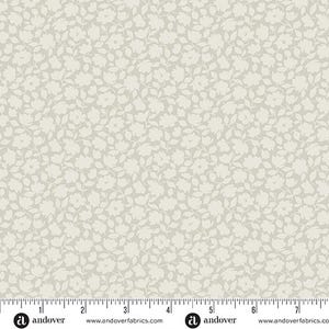 May include: A white floral print fabric with a light gray background. The fabric features a repeating pattern of small white flowers and leaves.