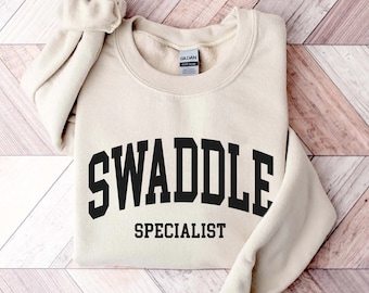 Swaddle Specialist Sweatshirt, NICU, Mother Baby Nurse Tech Crewneck Shirt, Neonatal ICU Registered Nurse, Gift for New Grad Student