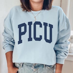 PICU-sjuksköterska, PICU-pediatrisk sjuksköterska, PICU-sjuksköterska, present till sjuksköterska, present till uppskattning av sjuksköterska, pediatrisk intensivvårdsavdelning, PICU-tröja Light Blue