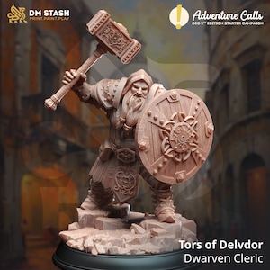 May include: A brown figurine of Tors of Delvdor, a Dwarven Cleric, wielding a hammer and shield. The figure is on a rocky base. The image includes the text "Adventure Calls" and "DM STASH PRINT.PAINT.PLAY".