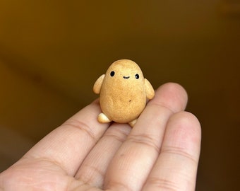 Miniature Pet Potato 1 inch tall.