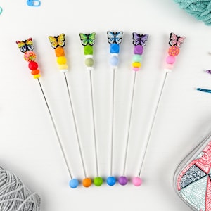 Custom Amigurumi Sewing Stick with Rainbow Butterfly Charm Topper