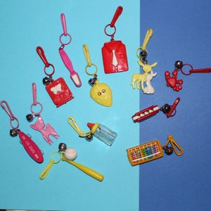 1980's Clip Charms With Bells, Snow Skis, Baby Bottle