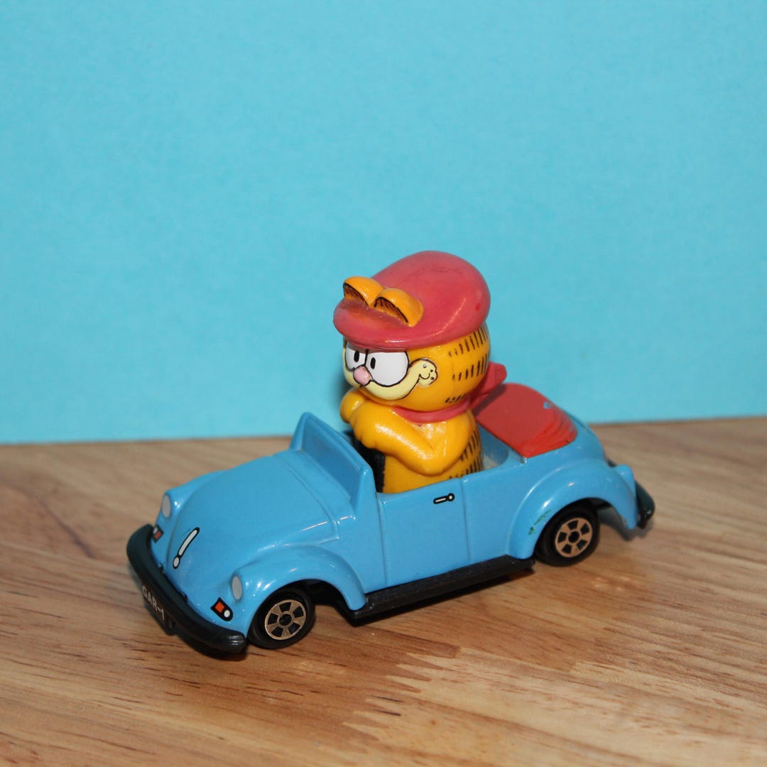 Garfield Aut Garfield de ERTL vintage conduciendo un coche descapotable, juguete de ...