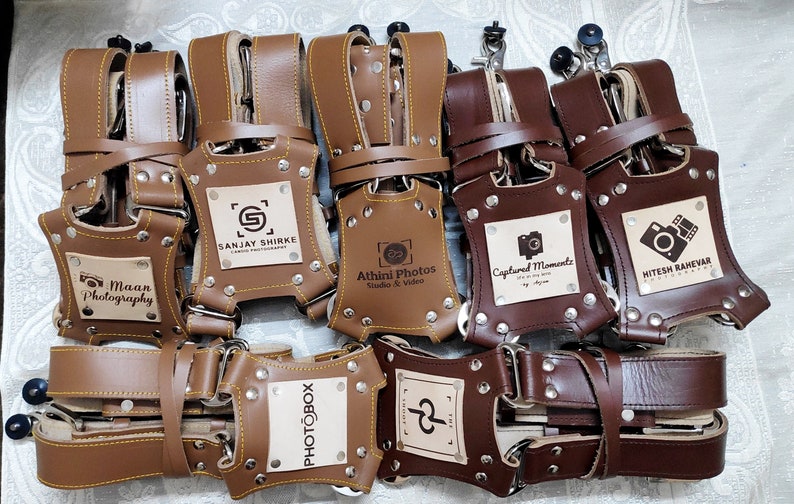 camera harness in leather with personalized logo in Dark brown color