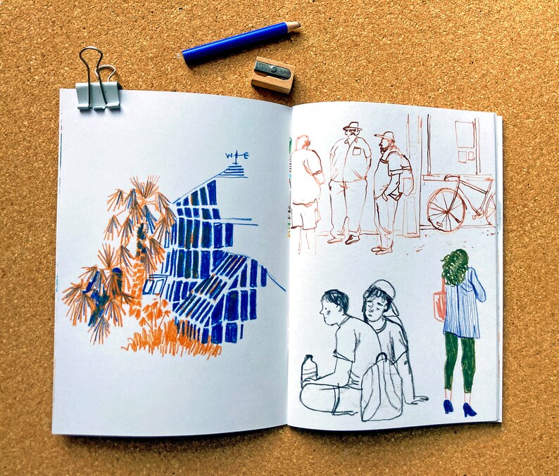 May include: An open sketchbook with a blue and orange drawing of a building and palm trees on the left page. The right page has a black and white drawing of people standing and walking, and a person with a backpack walking away.