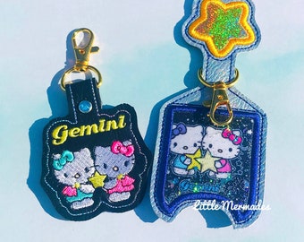 cute cat keychain for girls, cartoon cat hand sanitize holder keychain for women, May June birthday gifts, gemini gifts, kawaii cat backpack