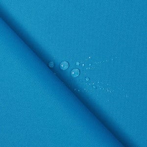 May include: Close-up of a vibrant turquoise fabric with a subtle woven texture. Several water droplets are scattered across the surface, indicating a water-resistant or waterproof material. The fabric is folded, showing its thickness and drape.