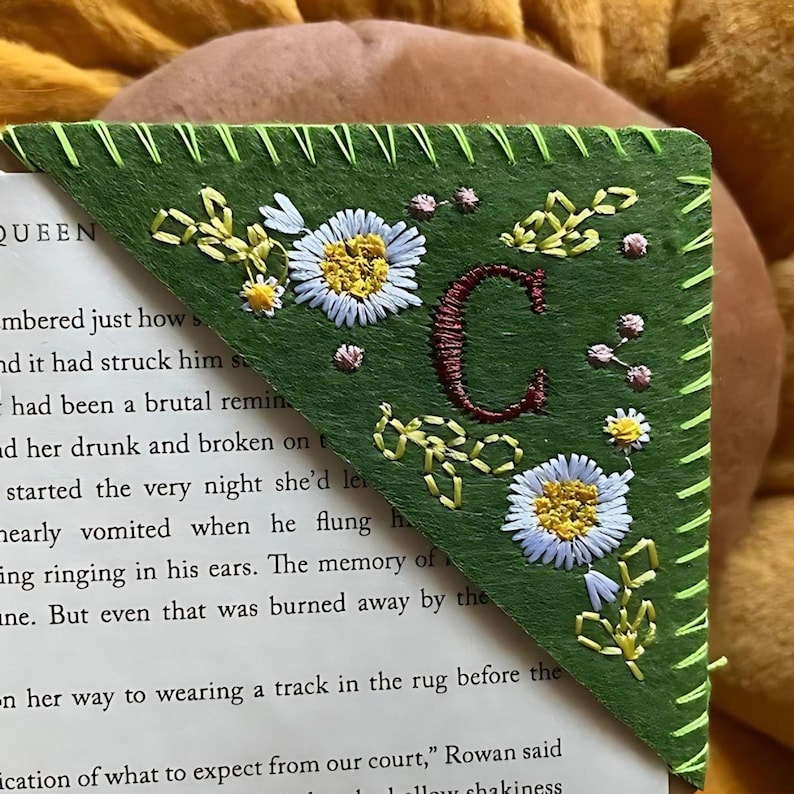 A green floral corner bookmark