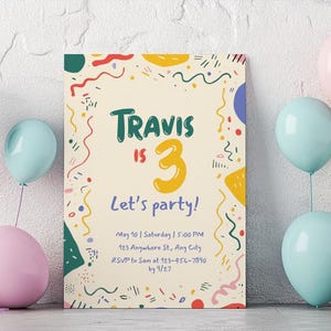 May include: A birthday party invitation with the text "Travis is 3, Let's party!" surrounded by colorful confetti and shapes. Pastel blue, pink, and yellow balloons are arranged around the invitation, creating a festive atmosphere.
