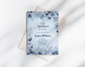 May include: A baby shower invitation with a light blue background and a floral heart design. The text reads "A little Sweetheart on the way" and invites guests to honor Jessica Williams.