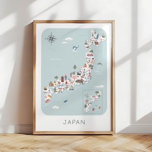 May include: A framed map of Japan with a light blue background and a wooden frame. The map features illustrations of landmarks and symbols, including a compass rose, trees, and animals. The word "JAPAN" is printed at the bottom.
