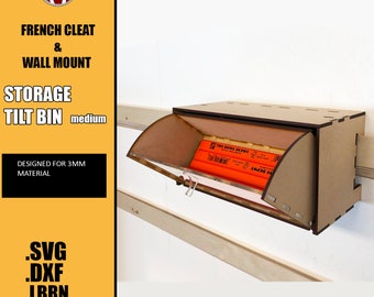 May include: A medium-sized tilt bin storage box made of 3mm material. The bin is mounted to a wall using a French cleat system. The bin is open and has several orange pencils inside. The bin is designed for laser cutting and comes with SVG, DXF, and LBRN files.