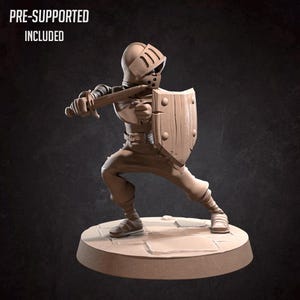 May include: A tan-colored figurine of a knight in full armor, holding a sword and shield. The knight is in a defensive stance, with the text "PRE-SUPPORTED INCLUDED" at the top.