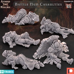 May include: A selection of grey miniature figurines of fallen, armoured figures. The text "Battle Nun Casaulities" is visible. The figurines are designed for tabletop gaming and are compatible with "Battle Nuns".