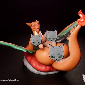 May include: A 3D-printed orange and red Charizard figure with three gray cat faces. The figure has green wings and a red flame on its tail. The base is red and white. The text "patreon.com/MowMaw" is at the bottom.