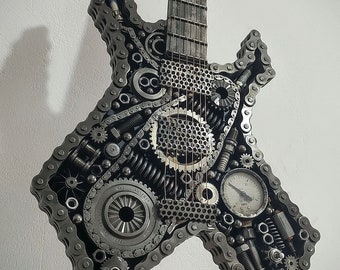 Handmade electric guitar from auto parts. Art metal, chain, bolt, nut, spring, a candle, dear wheel, manometer, camp, ball, decor, gift.