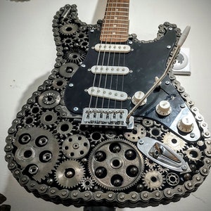 Fully Functional Electric Guitar Handmade of Scrap Metal Autoparts ...