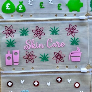 May include: Three translucent plastic zipper pouches with six-hole punched edges. The top pouch features green and white pound symbols, a green piggy bank, and the text Personal Pension. The middle pouch has pink and green floral icons and the text Skin Care. The bottom pouch displays medical icons and the text Prescriptions.