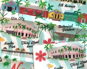 May include: A white tea towel featuring a colourful illustrated map of Naples, Florida. The map highlights landmarks such as the Naples Players, Tin City, Third Street South, Naples Pier, and the Botanical Gardens. The text "Naples" is written in a large, stylised font.