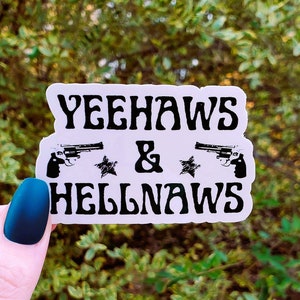 May include: White sticker with black text that reads "Yeehaws & Hellnaws" with two black and white stylized pistols and stars on either side of the ampersand.