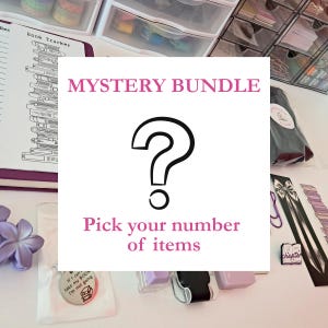 May include: A collection of stationery items, including a book tracker, bookmarks, and a keychain. The image features a white square with a large black question mark and the text "MYSTERY BUNDLE" and "Pick your number of items" in pink.